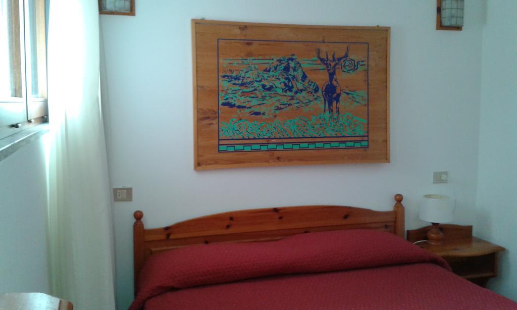 Cervinia Due Aparthotel Бройл-Червиня Стая снимка